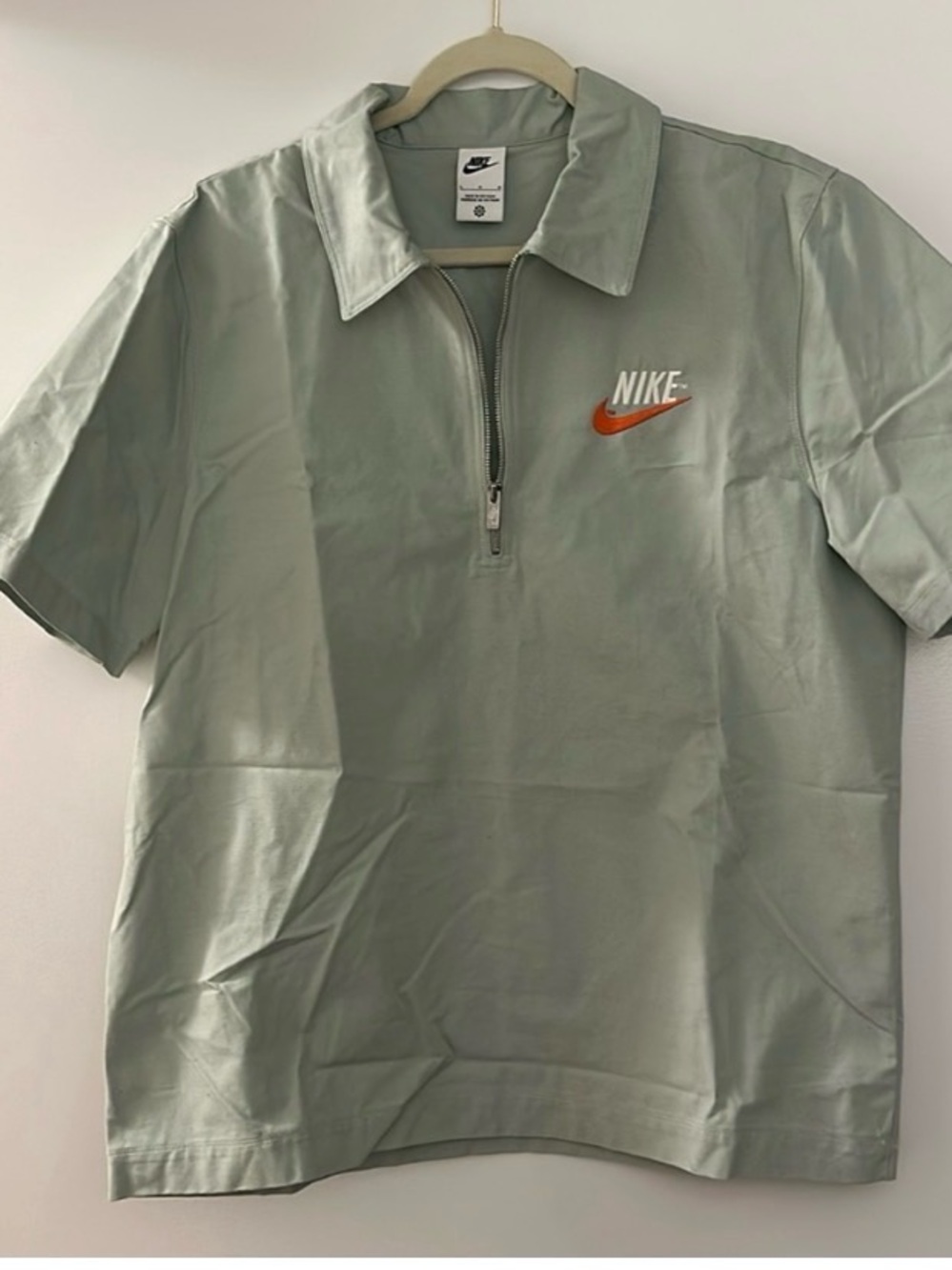 Nike Light Green Half-Zip Polo with Orange Swoosh